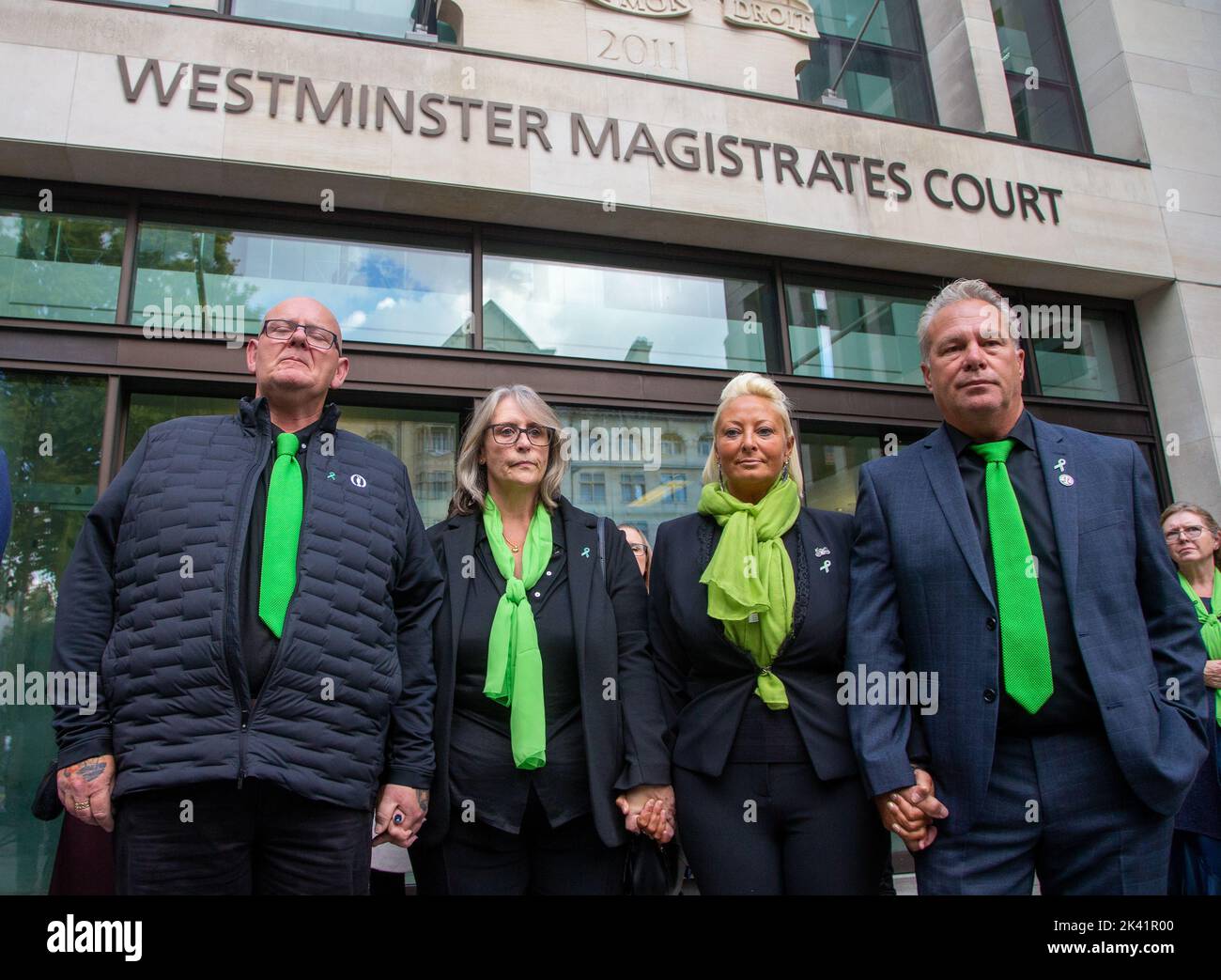 London, England, UK. 29th Sep, 2022. Harry Dunn's father TIM DUNN (1st L) and mother CHARLOTTE CHARLES (3rd L)with their partners are seen outside Westminster Magistrates' Court. Harry Dunn was killed in a car accident by an American diplomat's wife Anne Sacoolas outside the US military base RAF Croughton in Northamptonshire on 27 August 2019. Sacoolas participated in first trial session from US by video link. (Credit Image: © Tayfun Salci/ZUMA Press Wire) Stock Photo