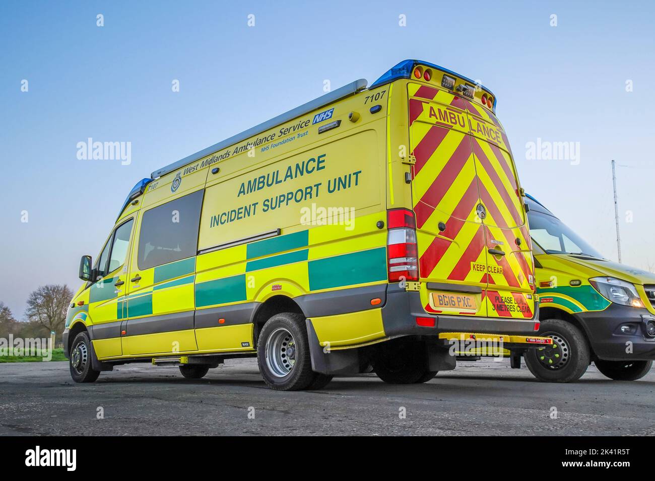 Low angle, side/rear view of a West Midlands Ambulance Incident Support Unit vehicle parked outdoors. Stock Photo