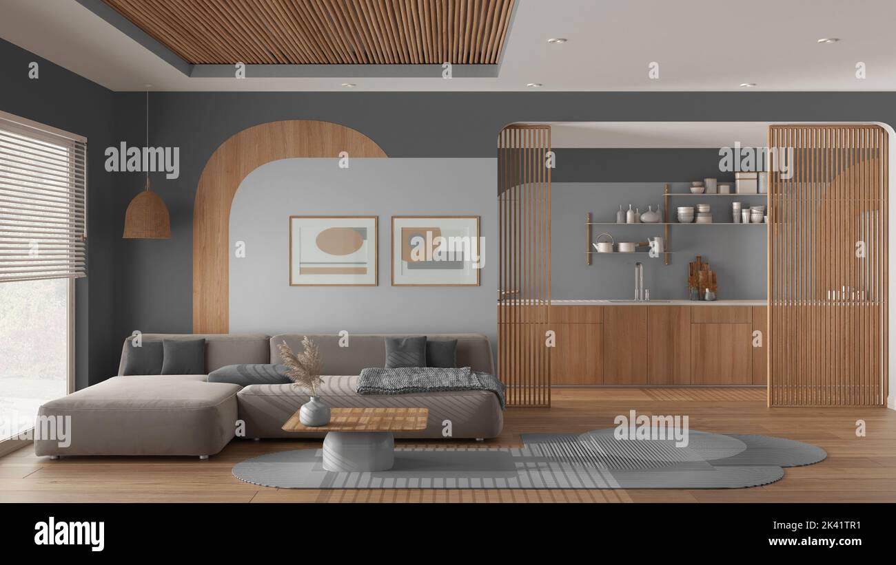 Modern wooden kitchen and living room in gray tones, velvet sofa with ...