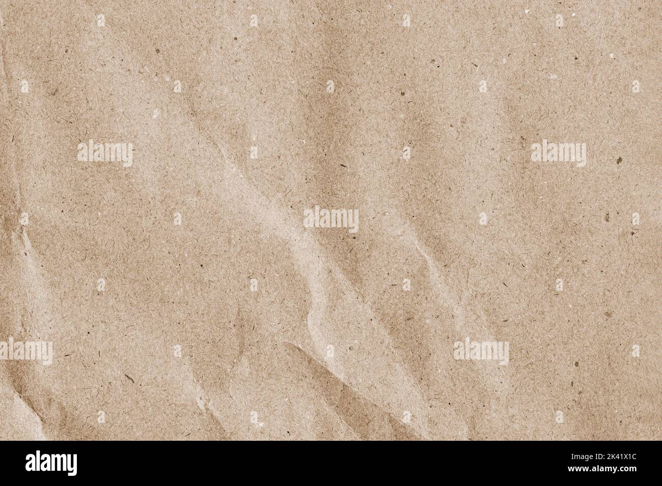 Natural background, texture of slightly crumpled kraft paper Stock Photo
