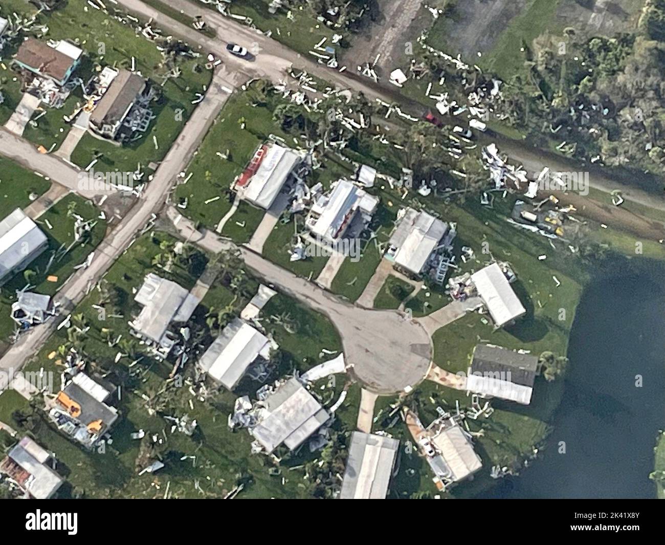 Fort Myers, United States. 29th Sep, 2022. Aerial views at first light of neighborhoods damaged by the massive Category 4 Hurricane Ian, that pounded the west coast of Florida, September 29, 2022 in Fort Myers, Florida. Credit: PO3 Kruz Sanders/US Coast Guard/Alamy Live News Stock Photo