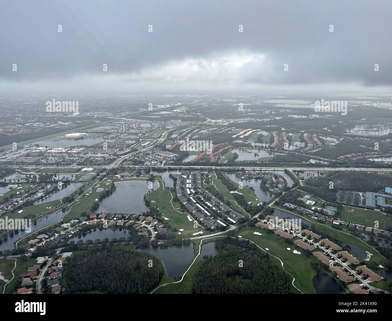 Fort Myers, United States. 29th Sep, 2022. Aerial views at first light of neighborhoods damaged by the massive Category 4 Hurricane Ian, that pounded the west coast of Florida, September 29, 2022 in Fort Myers, Florida. Credit: PO3 Kruz Sanders/US Coast Guard/Alamy Live News Stock Photo