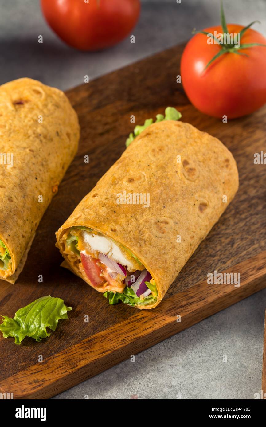 Homemade Fried Chicken Wrap with Lettuce and Tomato Stock Photo Alamy