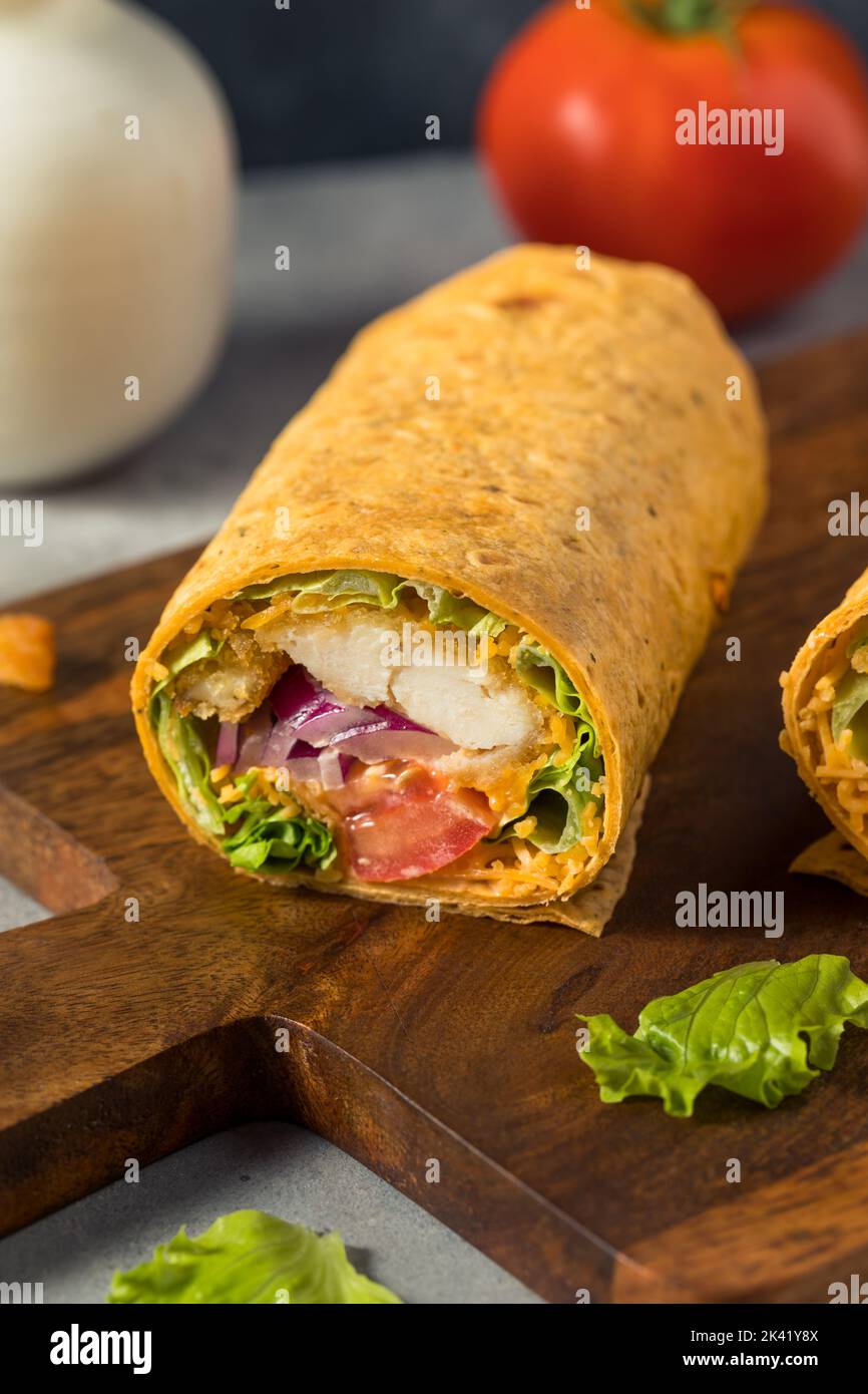 Homemade Fried Chicken Wrap with Lettuce and Tomato Stock Photo Alamy