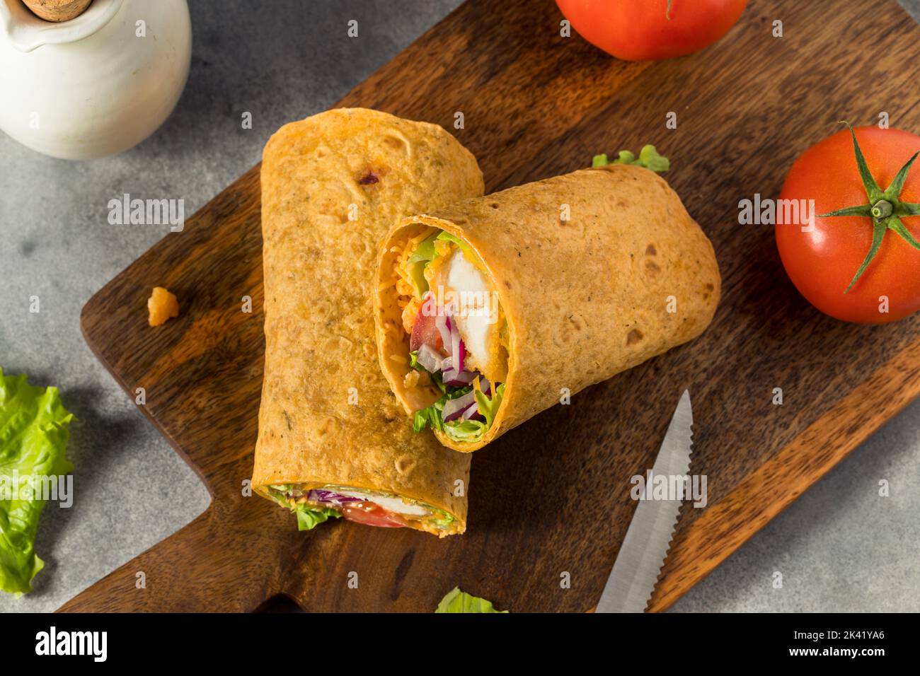 Homemade Fried Chicken Wrap with Lettuce and Tomato Stock Photo