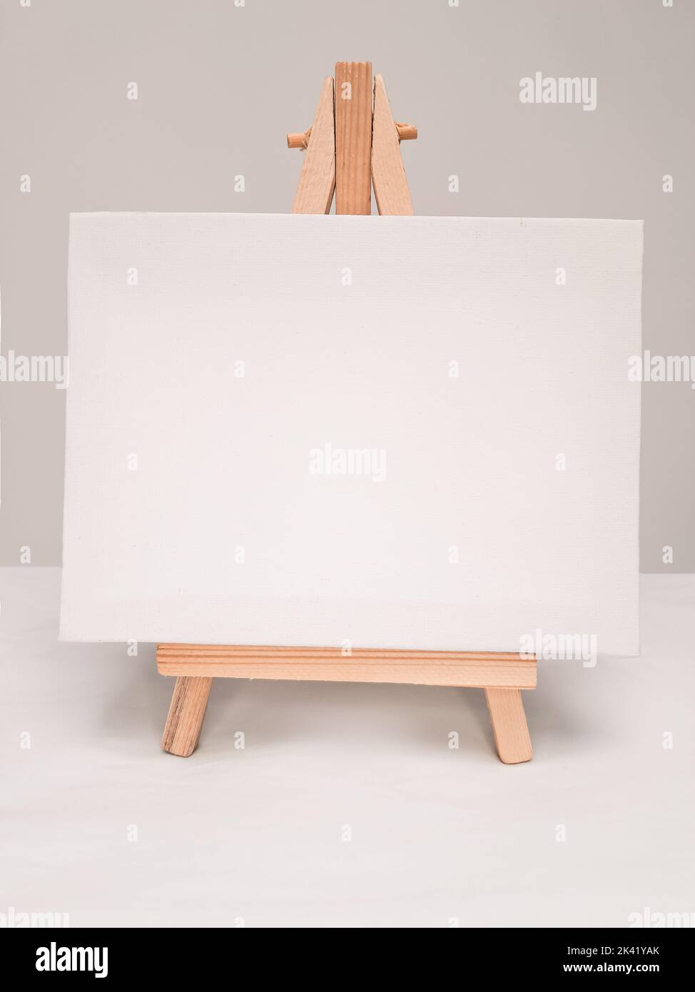 Close up of white empty easel for incriptions and pictures . High quality photo Stock Photo