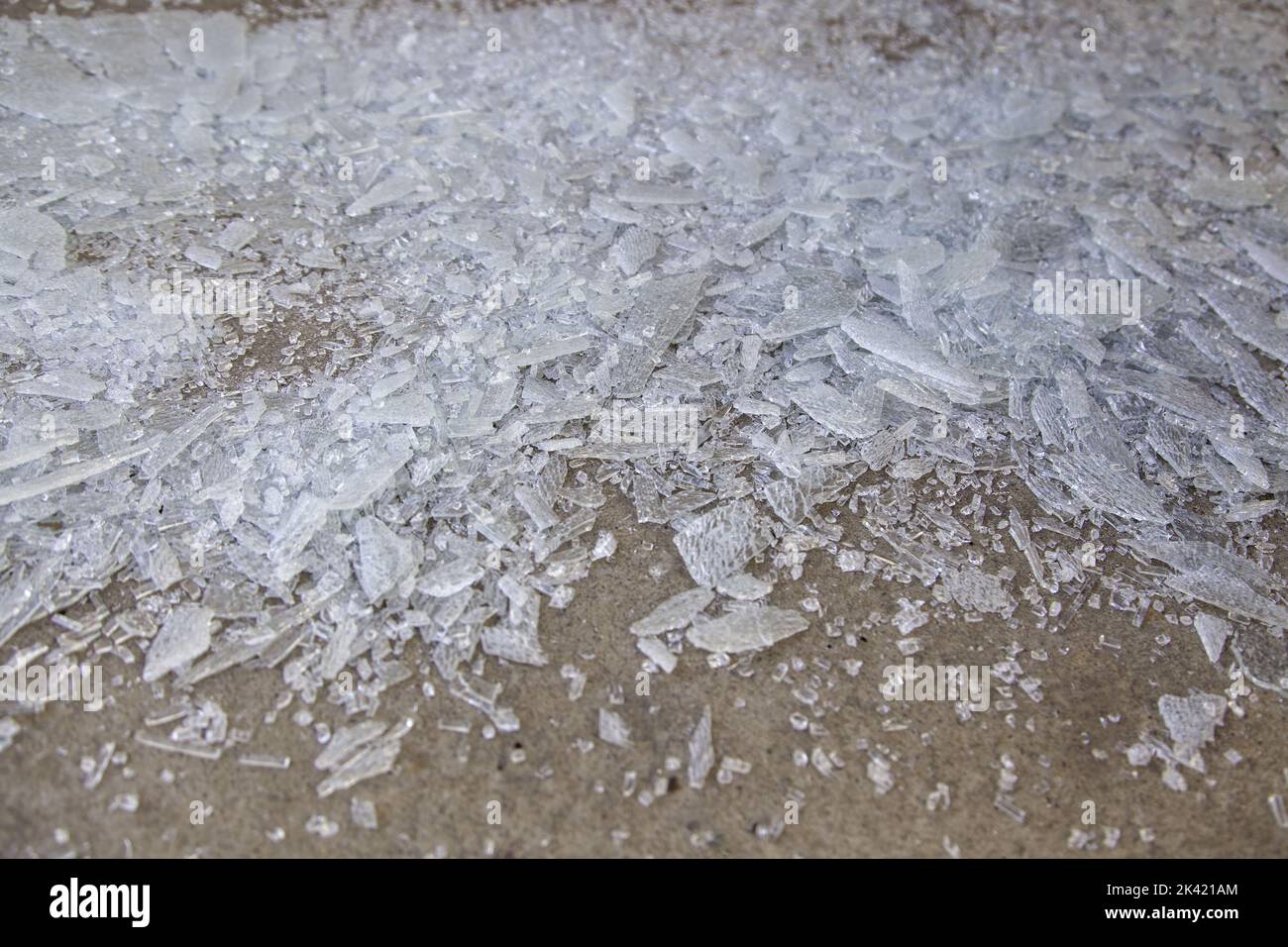 Detail of broken glass in the garbage, danger due to cuts Stock Photo