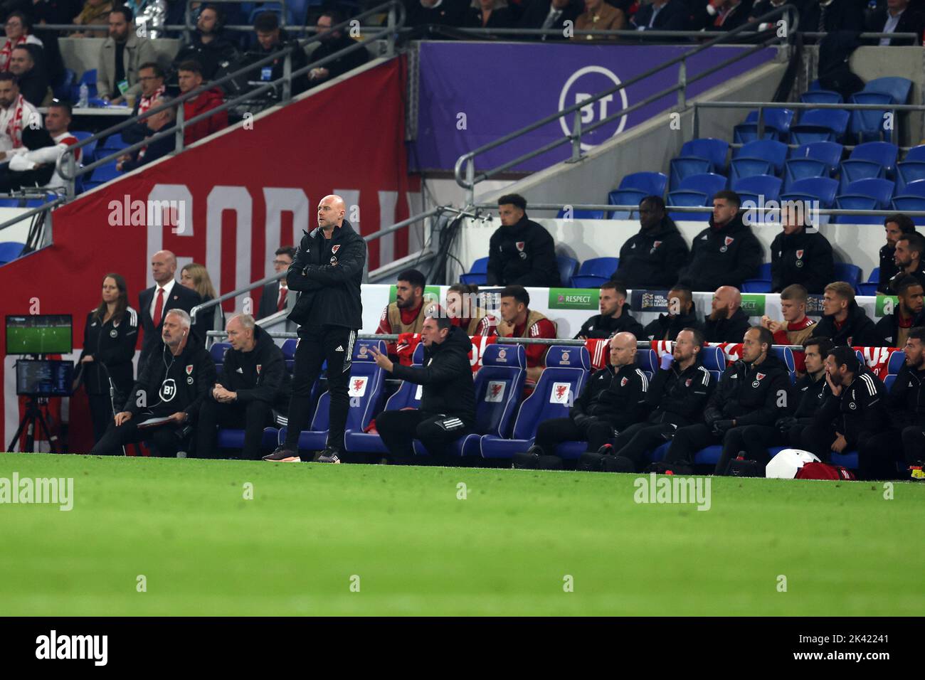 Rob Page, the manager of Wales and his coaching staff on the bench. UEFA Nations league, group D match, Wales v Poland at the Cardiff city stadium in Stock Photo