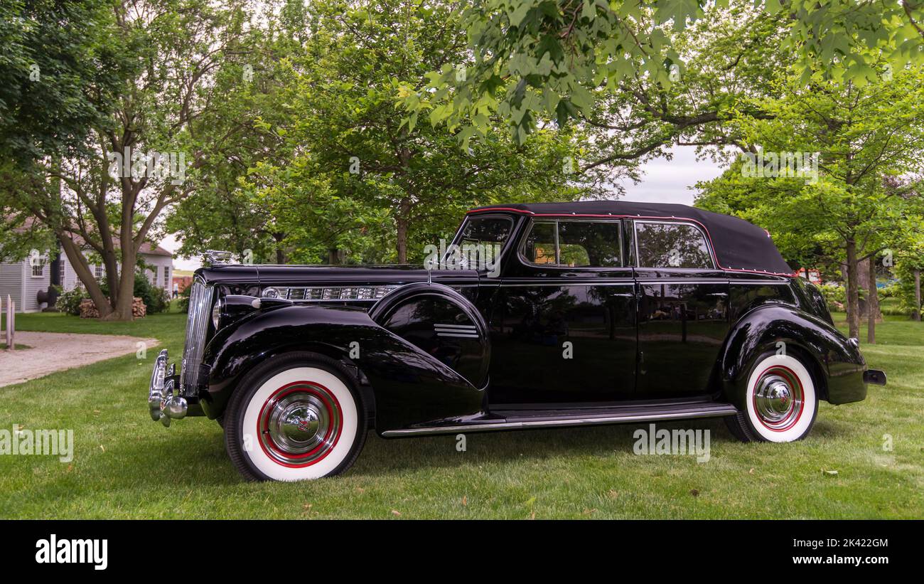 DEARBORN, MI/USA - JUNE 15, 2019: A 1940 Packard 120 car, The Henry Ford (THF) Motor Muster car show, at Greenfield Village, near Detroit, Michigan. Stock Photo