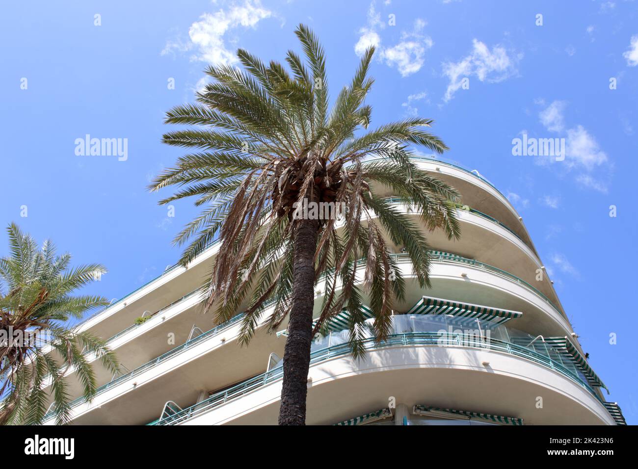 Abstract view of a modern apartment building and Palm Trees along the Promenade des Anglais