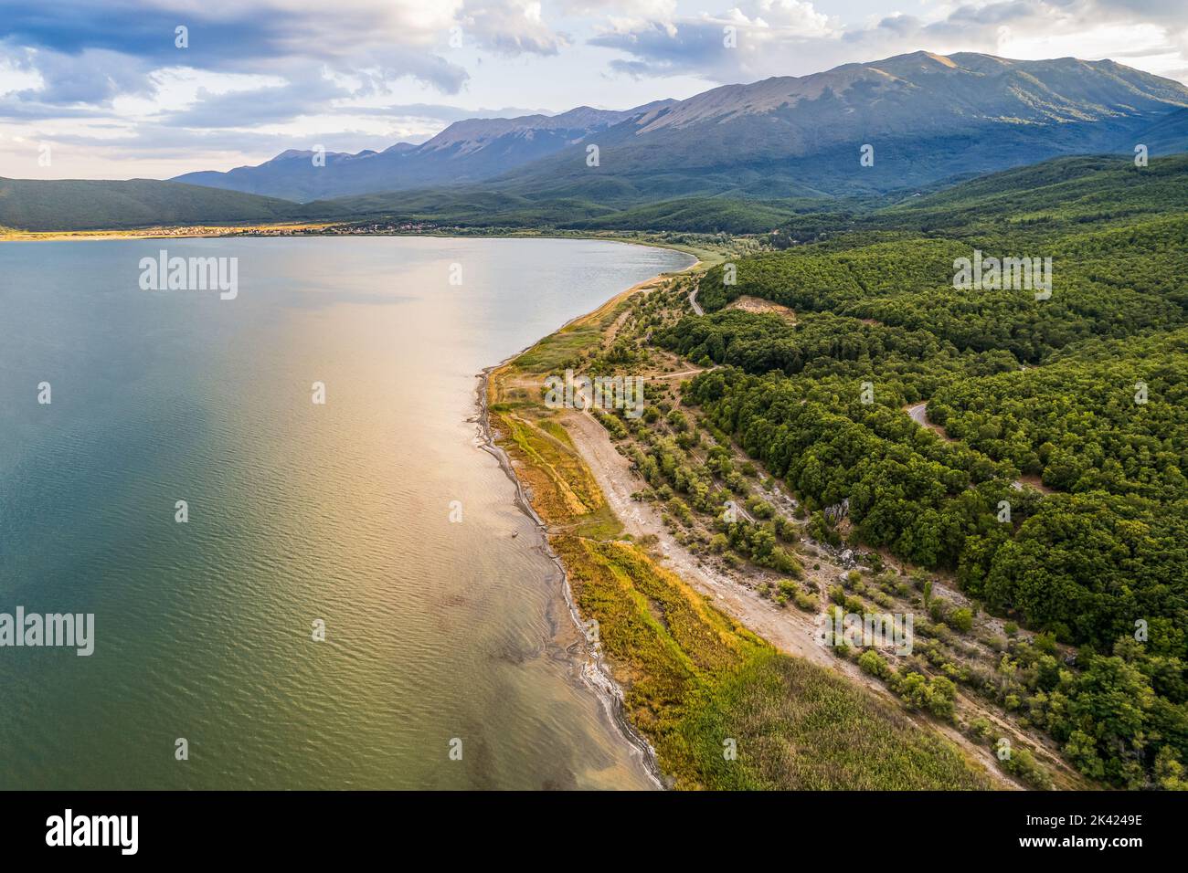 Aerial view of Ohrid-Prespa Transboundary Biosphere Reserve in National Park Galicica in North Macedonia, shore of Prespa lake in sunset Stock Photo