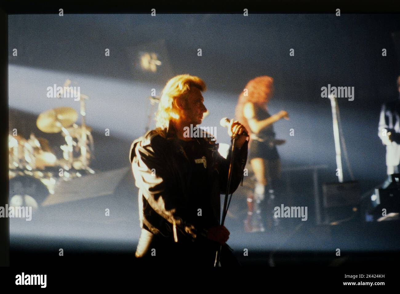 Archives 90ies: Rock singer Johnny Halliday performs in Lyon, France, 1991 Stock Photo