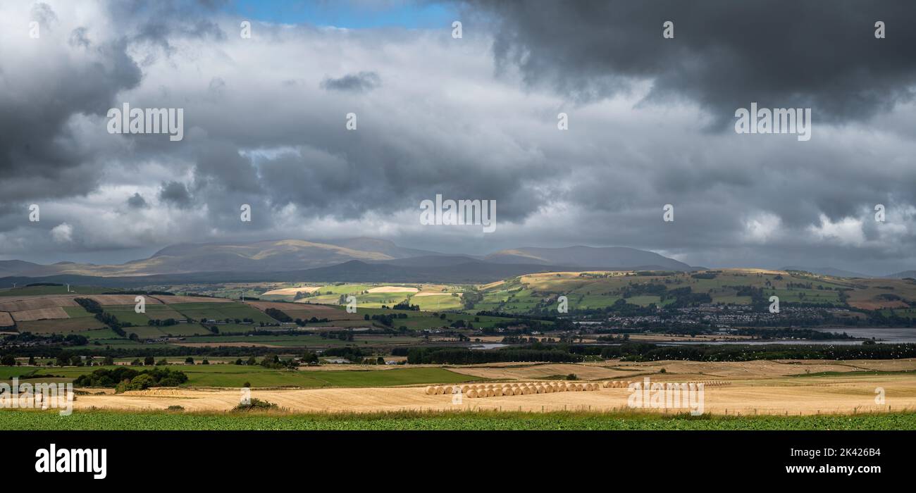 Looking north from Balnabeen, over the top end of the Cromarty Firth and on to Dingwall on a late summers day. Stock Photo