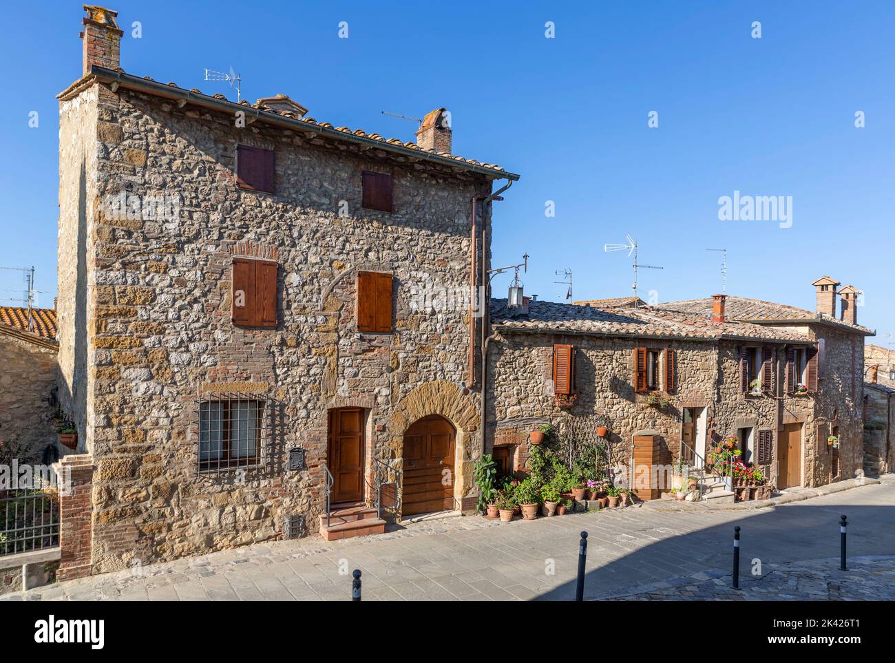 Traditional stone houses in italian town of Montefollonico Stock Photo