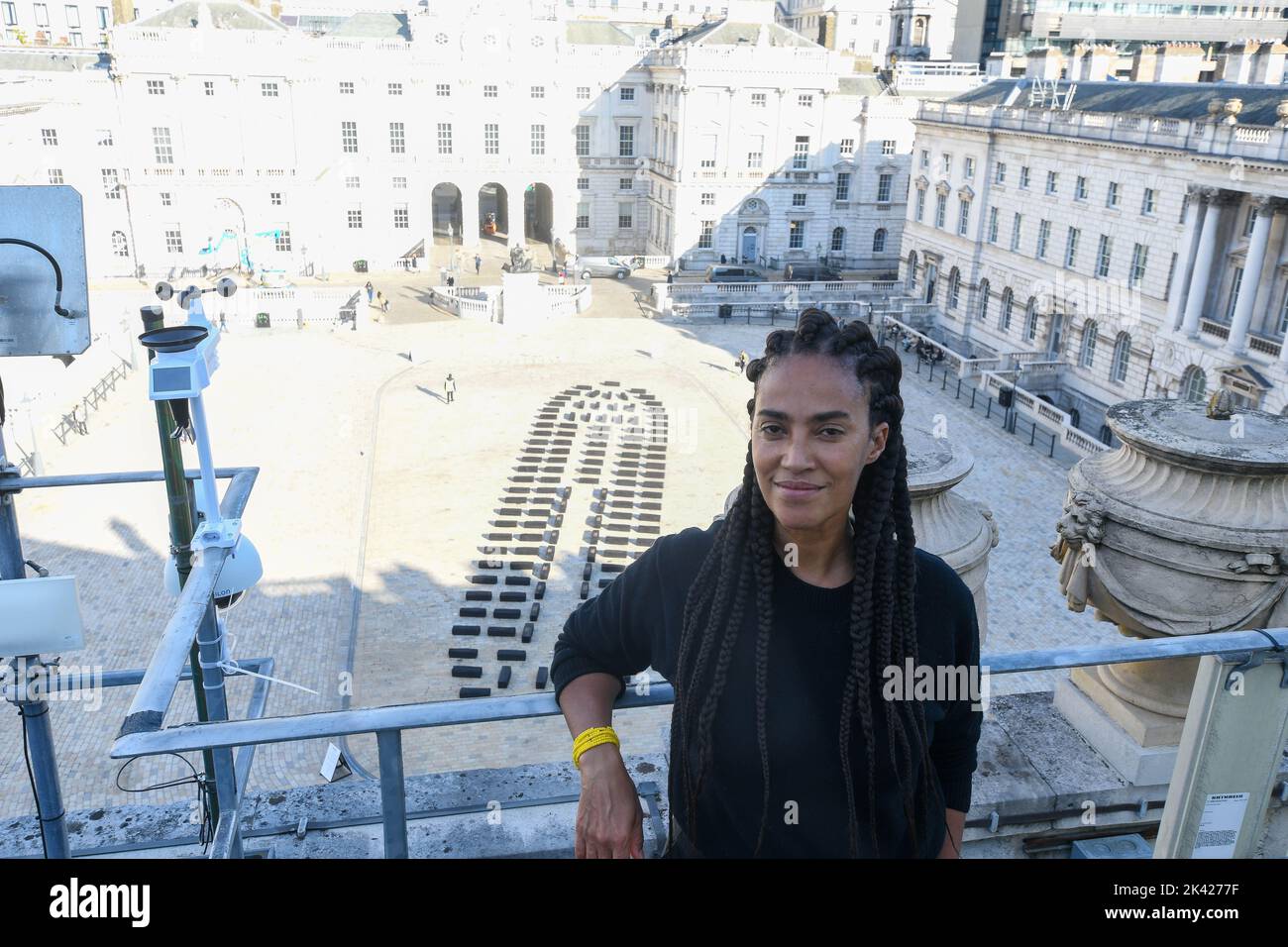 London, UK, 29/09/2022, O Barco/The Boat, large-scale installation by transdisciplinary artist Grada Kilomba, opens at Somerset House in London, to mark the 10th anniversary of 1-54 Contemporary African Art Fair. Formed of 140 wood blocks the 32-metre-long installation draws attention to the forgotten stories and identities of those who suffered during European maritime expansion and colonisation. Stock Photo