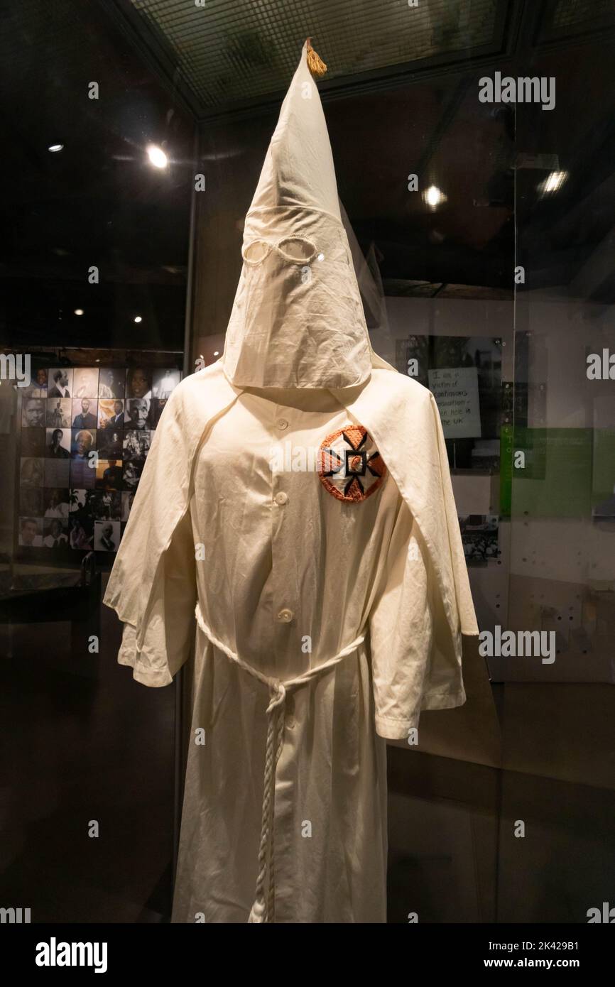 Statue of man in Ku Klux Klan hood and robe at International Slavery Museum at Royal Albert Dock in Liverpool Stock Photo
