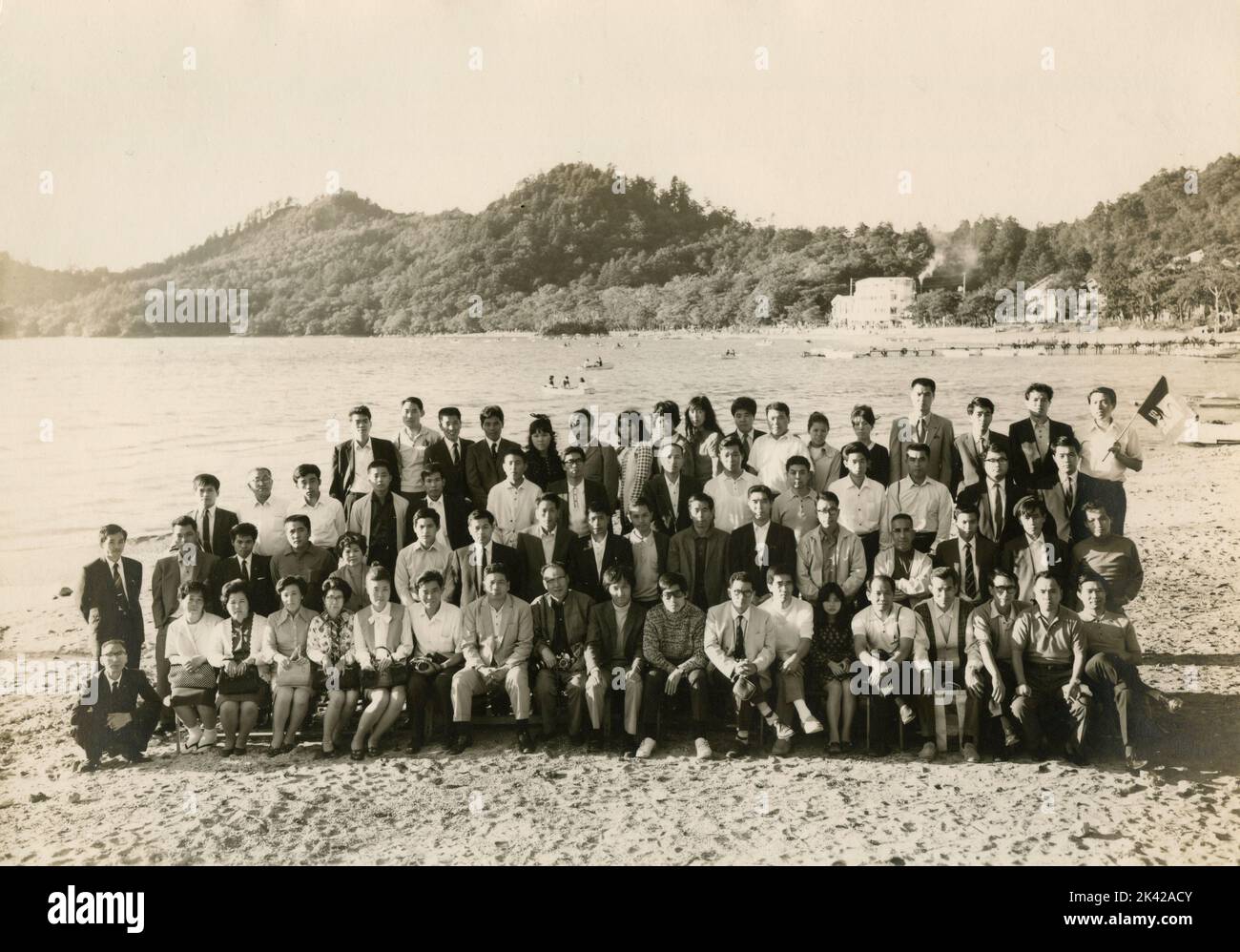 Large group of Japanese people outside posing for the photo, 1950s Stock Photo