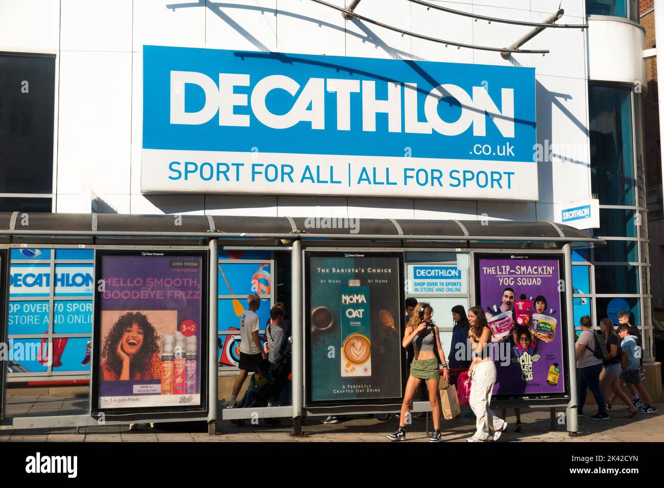 Shop exterior / outside of the Decathlon sports / sporting equipment shop / retailer / store in Brighton, East Sussex. UK, on a sunny day with sun. (131) Stock Photo