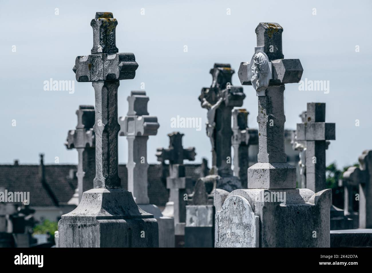 Tombstones and crosses at a french cemetery Stock Photo