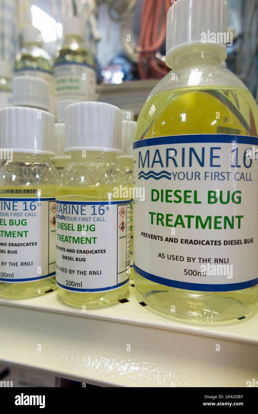 Bottles of treatment for 'Diesel Bug' for sale at a boat shop / ship