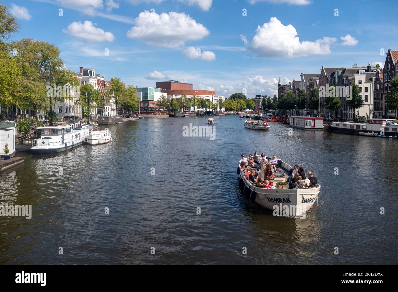 Canal and tour boat, Amsterdam, The Netherlands Stock Photo