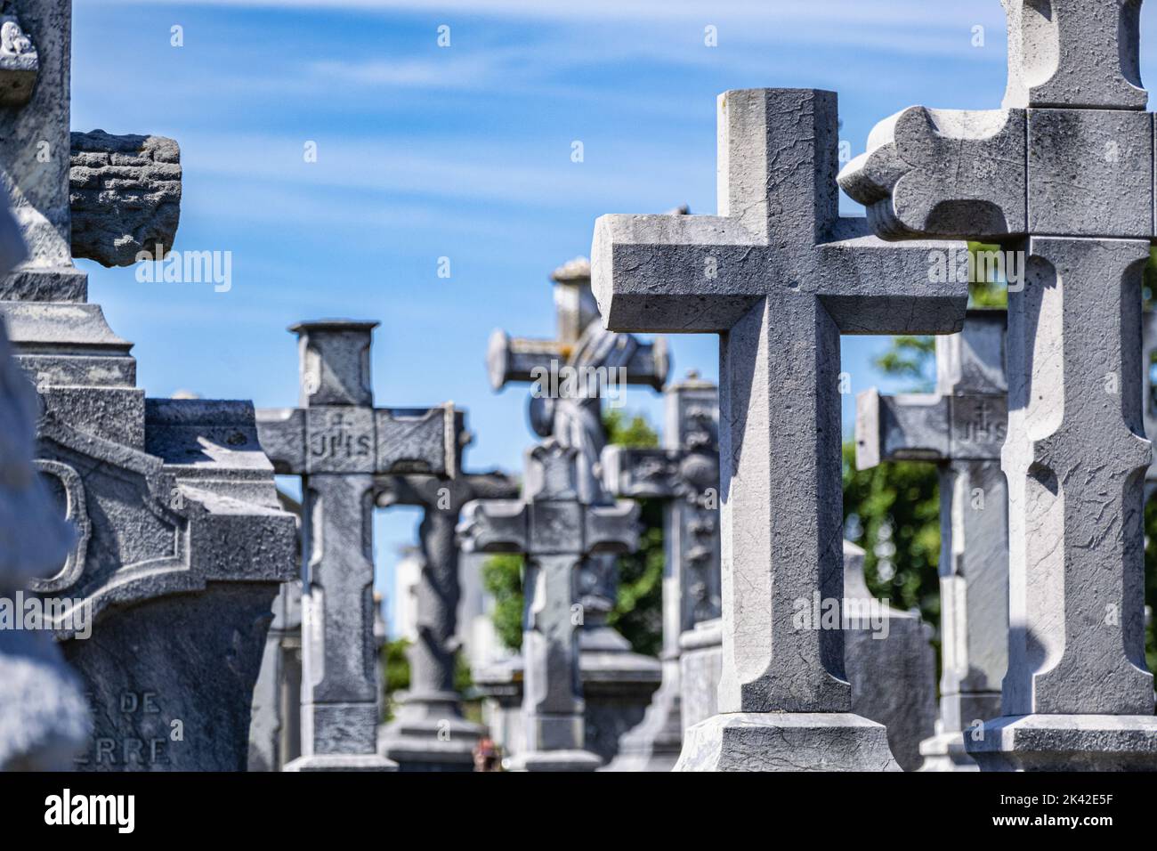 Tombstones and crosses at a french cemetery Stock Photo