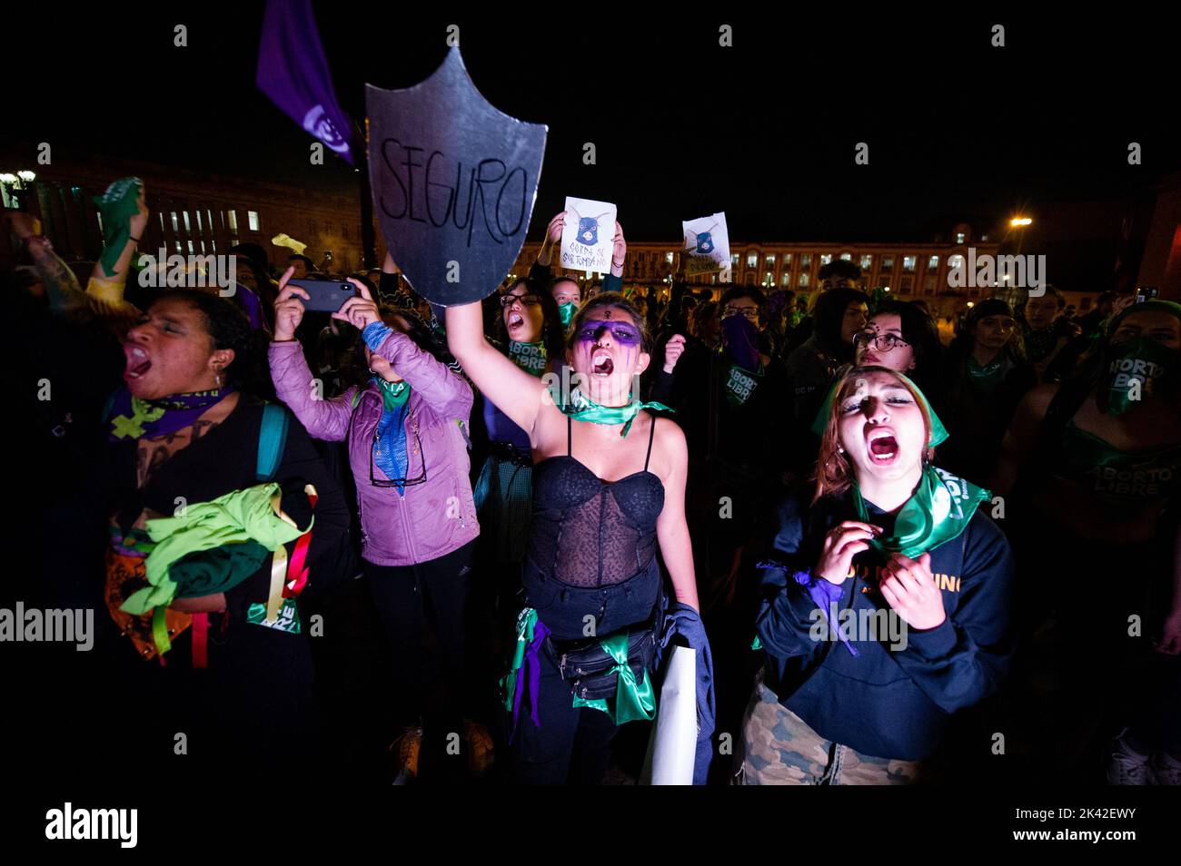 Demonstrators hold pro-choice signs and flags during the International Day for the Remembrance of the Slave Trade and its Abolition demonstrations in Stock Photo