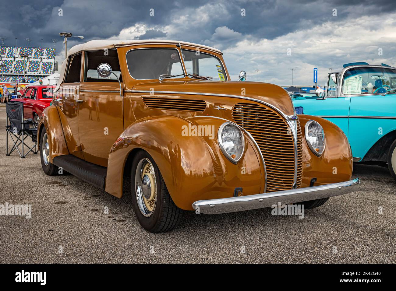 Daytona Beach, FL - November 28, 2020: Low perspective front corner view of a 1938 Ford Deluxe Model 82A 4 Door Convertible Sedan at a local car show. Stock Photo