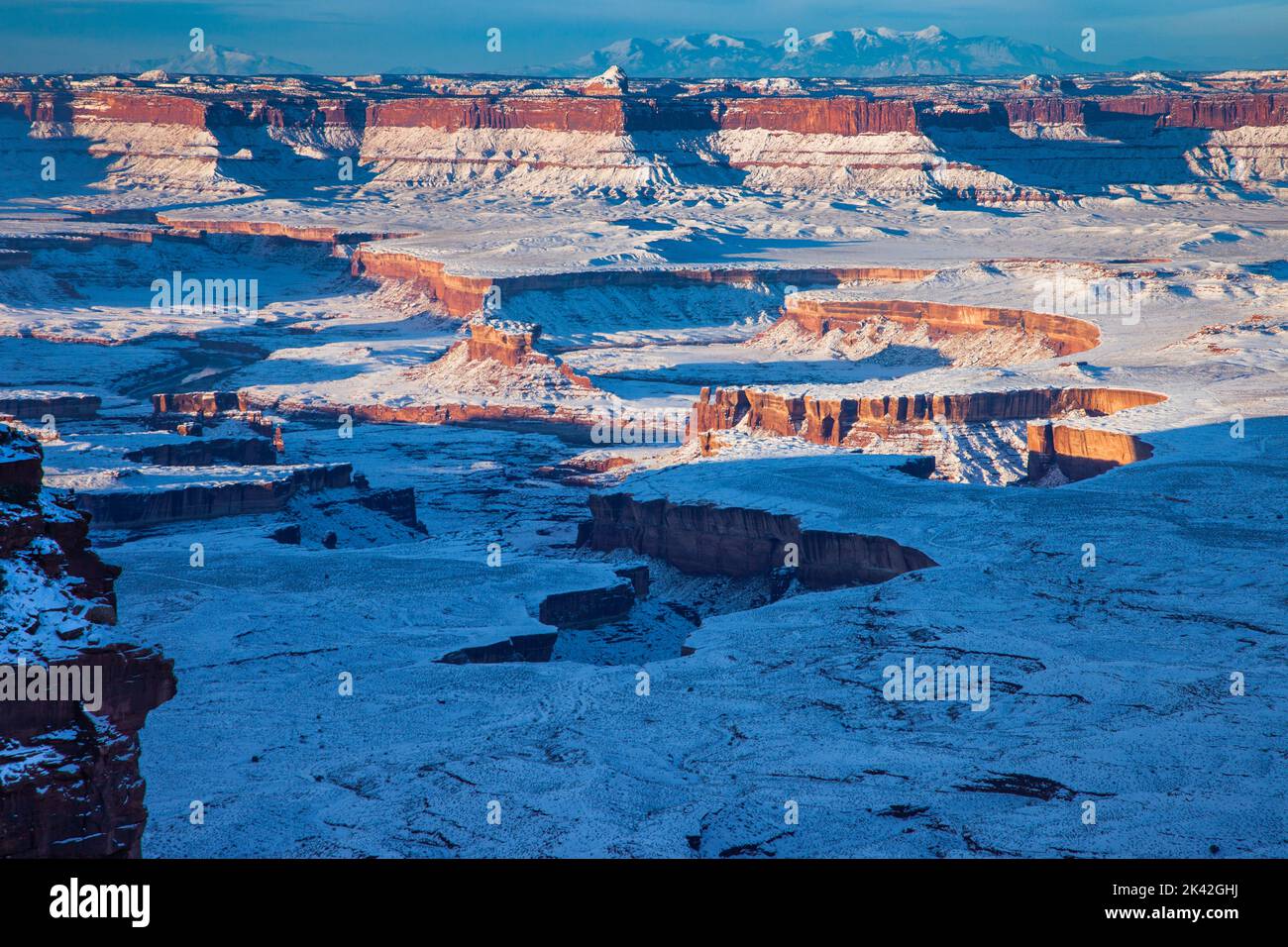 Winter view from Candlestick Tower Overlook in Canyonlands National Park, Utah.  Green River Basin and Turk's Head in front with the Orange Cliffs / G Stock Photo