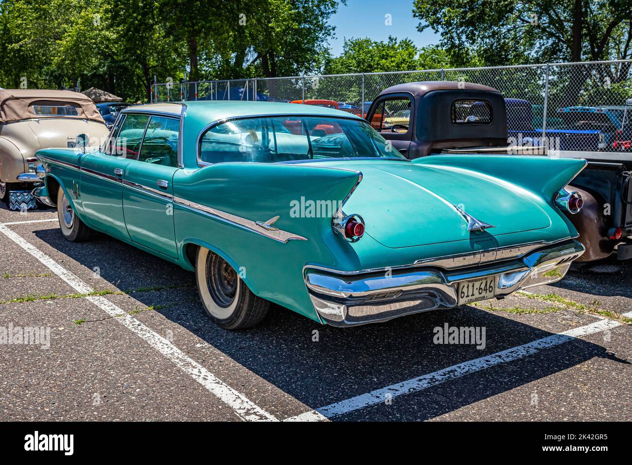 Falcon Heights, MN - June 18, 2022: High perspective rear corner view of a 1961 Chrysler Imperial Crown 4 Door Hardtop at a local car show. Stock Photo