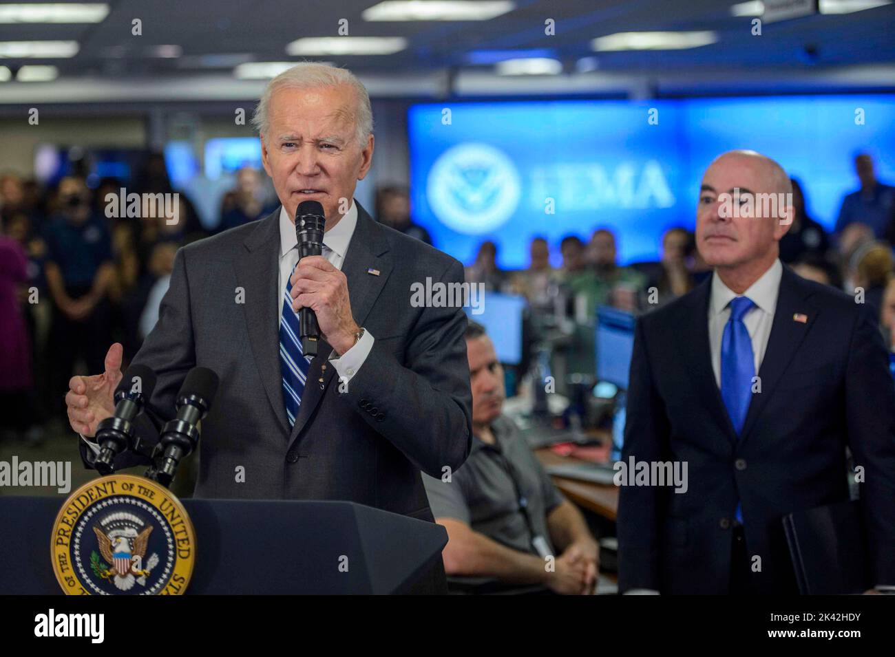 Washington, United States . 29th Sep, 2022. President Joe Biden speaks as Secretary of the Department of Homeland Security Alejandro Mayorkas looks on during a press conference after being briefed on the impact of Hurricane Ian and ongoing federal government response efforts at the FEMA Headquarters in Washington, DC on Thursday, September 29, 2022. Photo by Bonnie Cash/Pool/Sipa USA Credit: Sipa USA/Alamy Live News Stock Photo