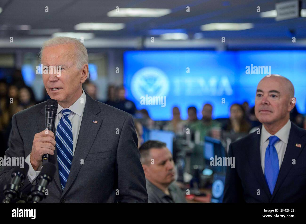 Washington, United States . 29th Sep, 2022. President Joe Biden speaks as Secretary of the Department of Homeland Security Alejandro Mayorkas looks on during a press conference after being briefed on the impact of Hurricane Ian and ongoing federal government response efforts at the FEMA Headquarters in Washington, DC on Thursday, September 29, 2022. Photo by Bonnie Cash/Pool/Sipa USA Credit: Sipa USA/Alamy Live News Stock Photo