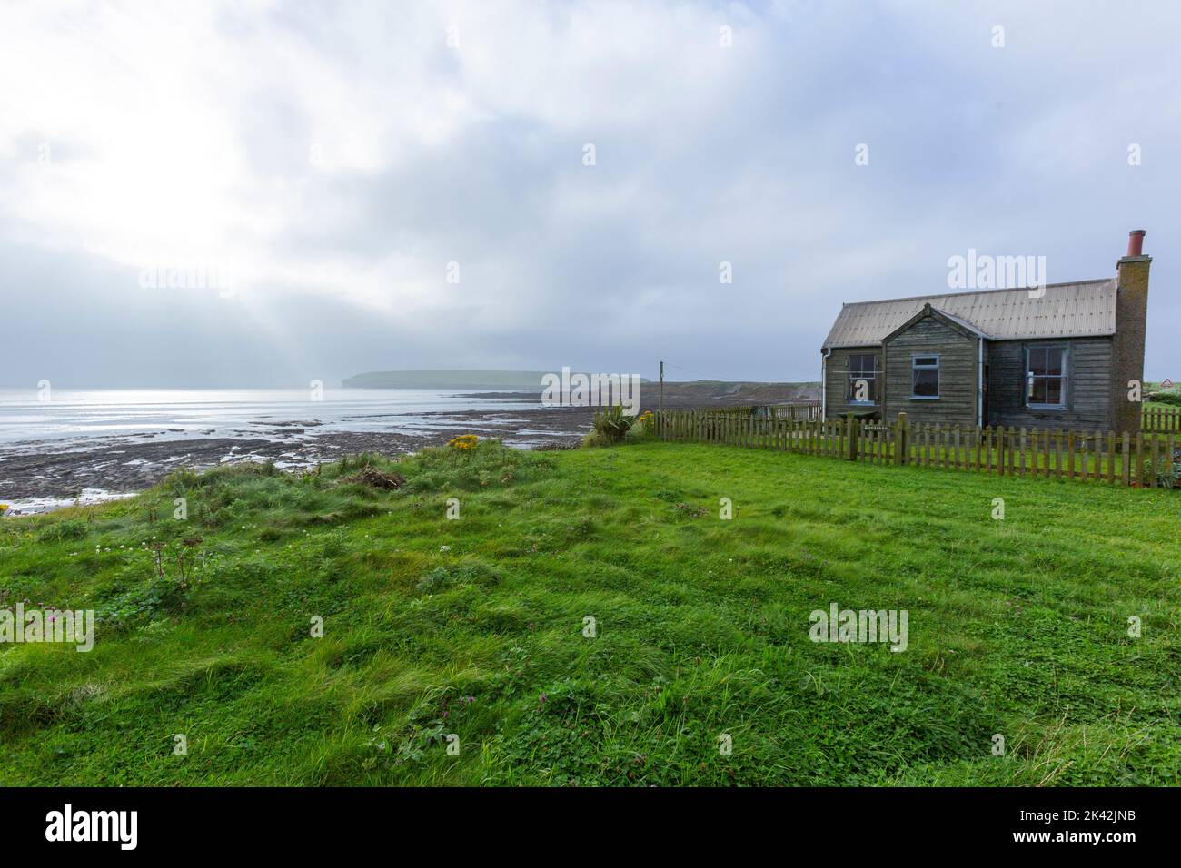 Wooden house in front of the bay, Brough of Birsay, The Mainland of Orkney, Scotland, UK Stock Photo