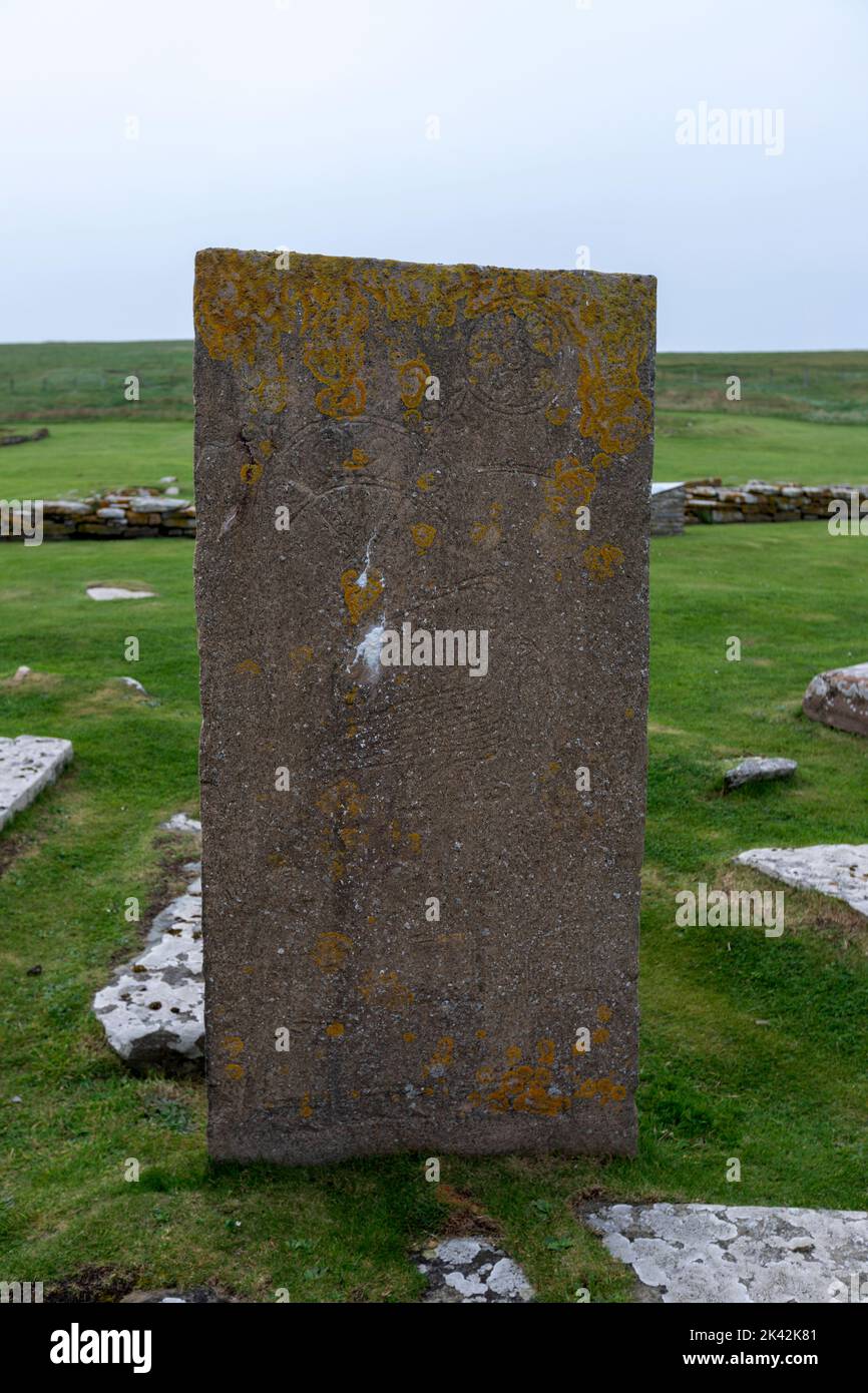 The replica Pictish stone and the remains of houses in Brough of Birsay, The Mainland of Orkney, Scotland, UK Stock Photo