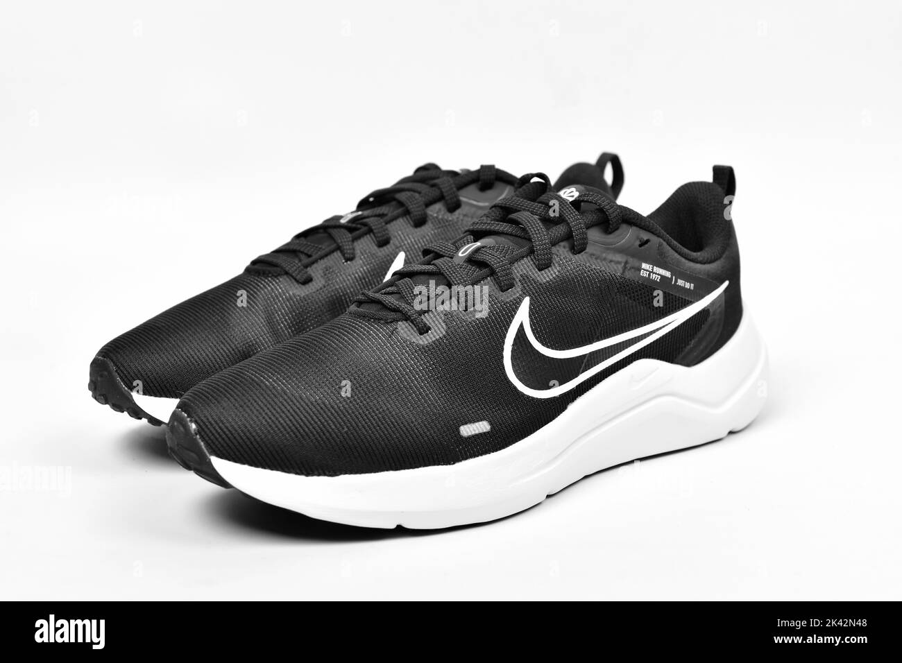 New Delhi, India - 29 September 2022 : Pair of Nike Running Shoes Isolated on White Background Stock Photo