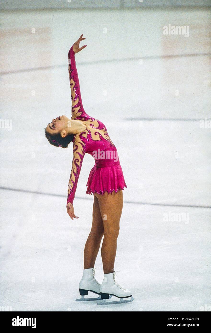 Katarina Witt (GDR) Gold medalist and Olympic Champion competing in the Ladies Figure Skating Free Skate at the 1984 Olympic Winter Games. Stock Photo