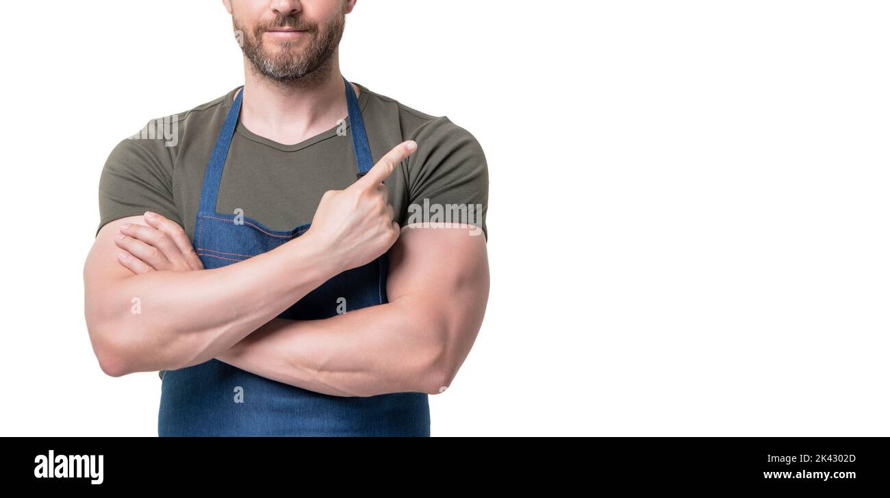 cropped view of man in apron isolated on white background. point finger Stock Photo