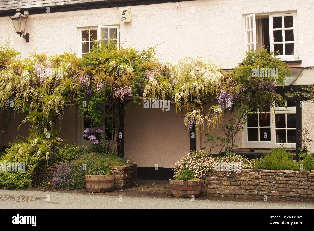 An entrance to a property in Lydford, Devon, England, with white and