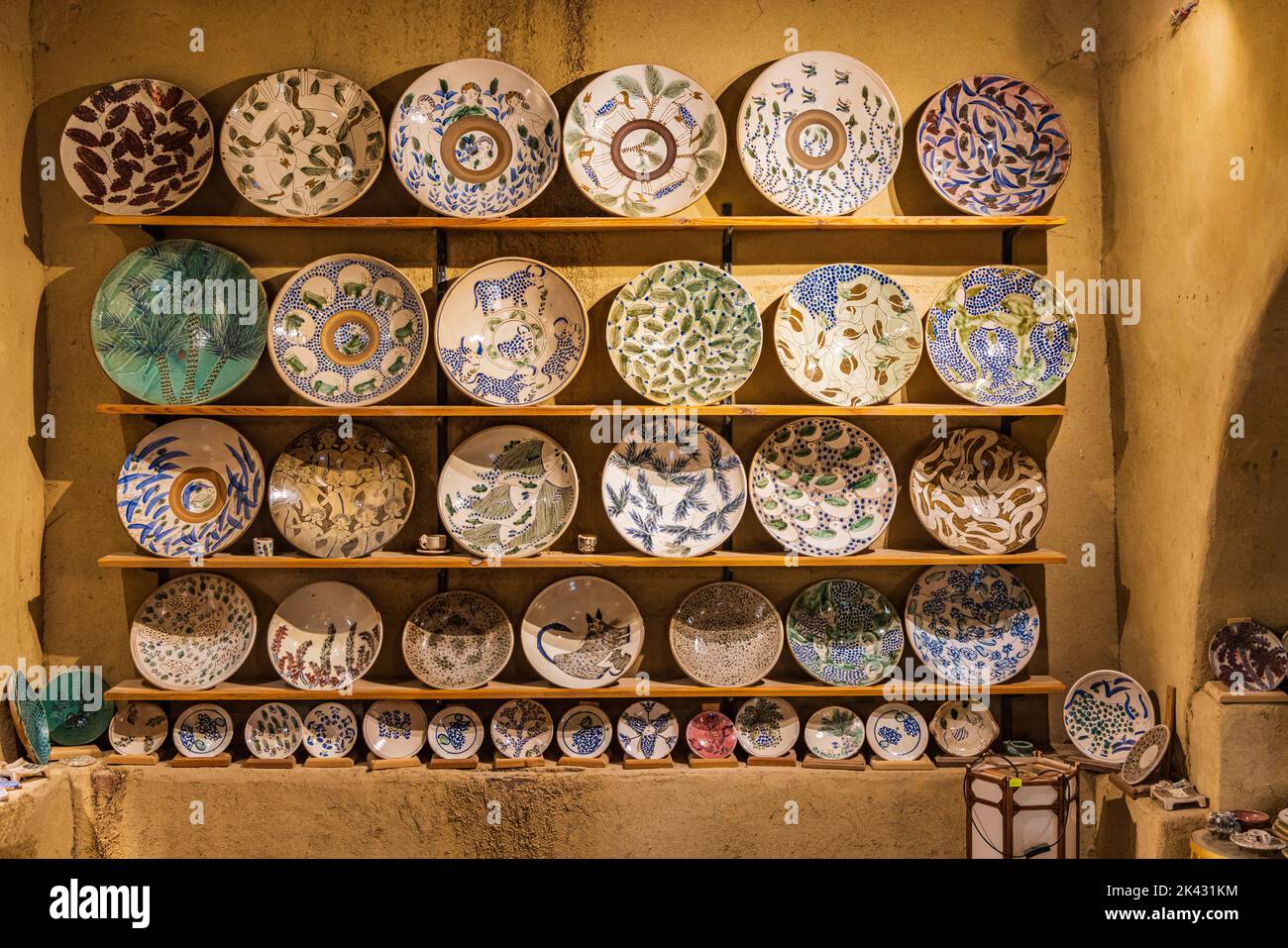 Faiyum, Egypt. February 19, 2022. Plates for sale at a ceramic shop in