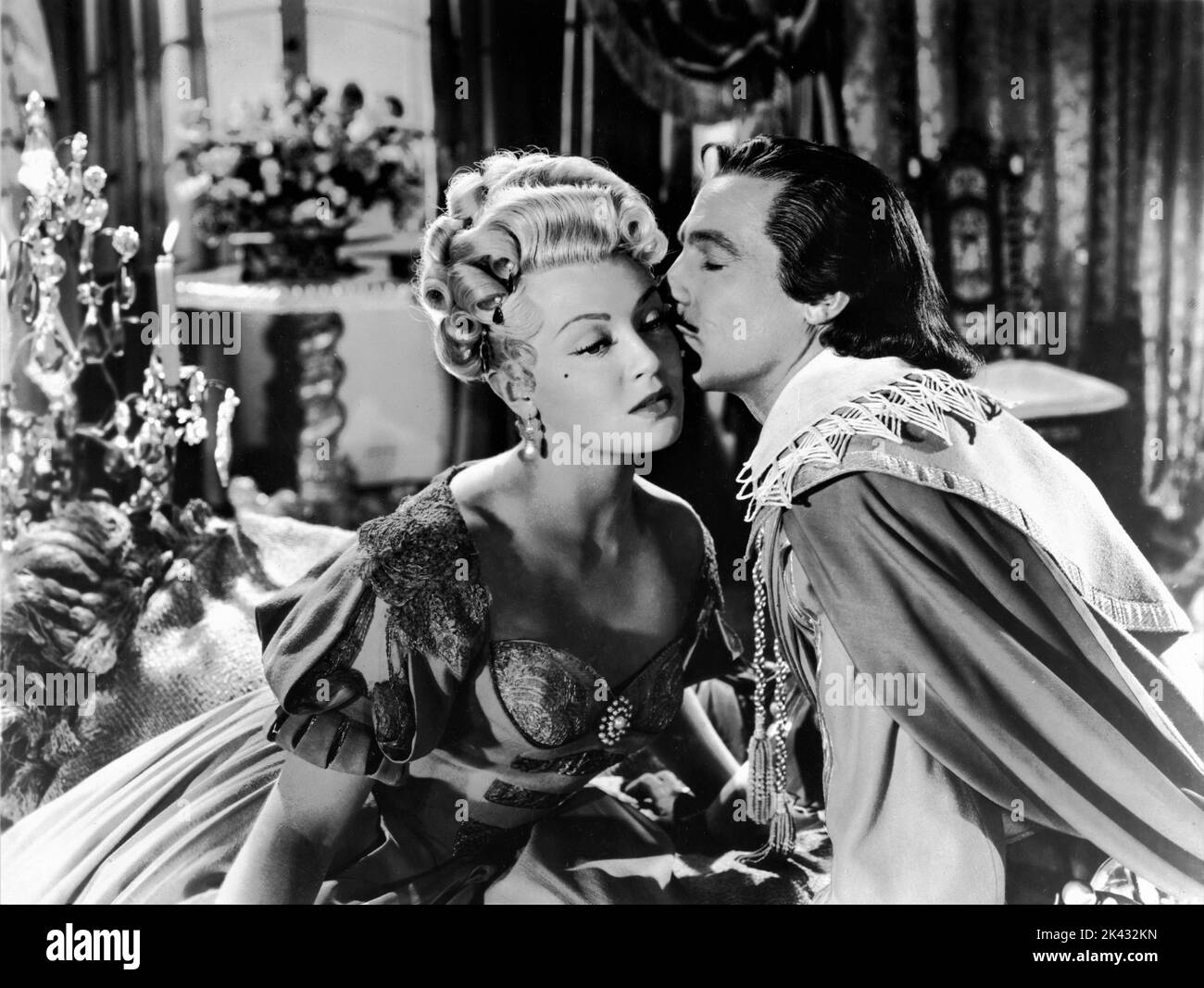 LANA TURNER as Lady de Winter and GENE KELLY as D'Artagnan in THE THREE