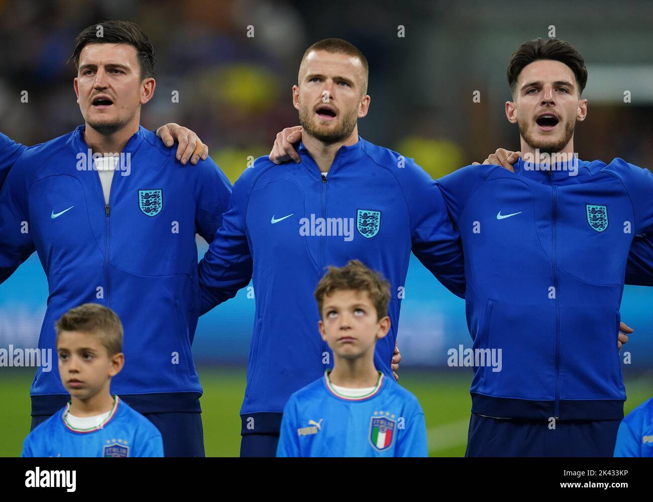 England's Harry Maguire (left), Eric Dier (centre) and Delcan Rice sing the national anthem before the UEFA Nations League Group C Match at San Siro Stadium, Italy. Picture date: Friday September 23, 2022. Stock Photo