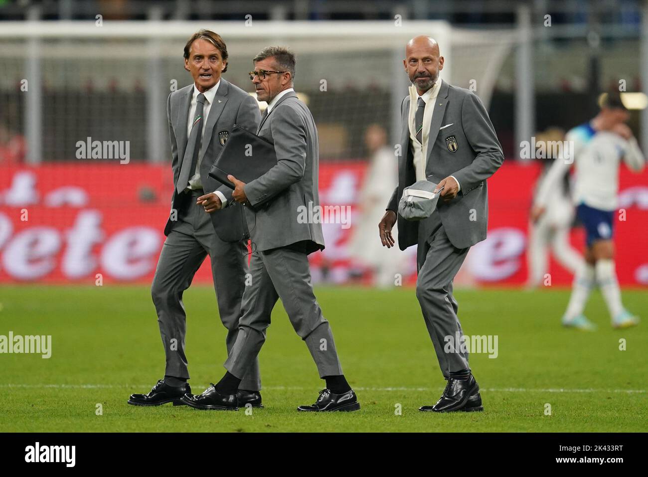 Italy head coach Roberto Mancini (left) with assistant coach Alberico Evani (centre) and coaching assistant Gianluca Vialli after the UEFA Nations League Group C Match at San Siro Stadium, Italy. Picture date: Friday September 23, 2022. Stock Photo