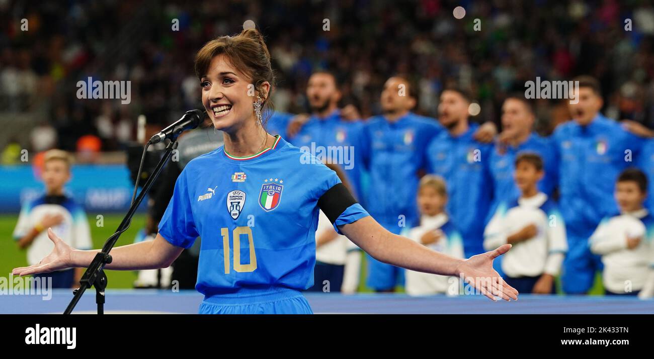 Opera singer Carly Paoli in a full Italy kit for the Italian national anthem during the UEFA Nations League Group C Match at San Siro Stadium, Italy. Picture date: Friday September 23, 2022. Stock Photo