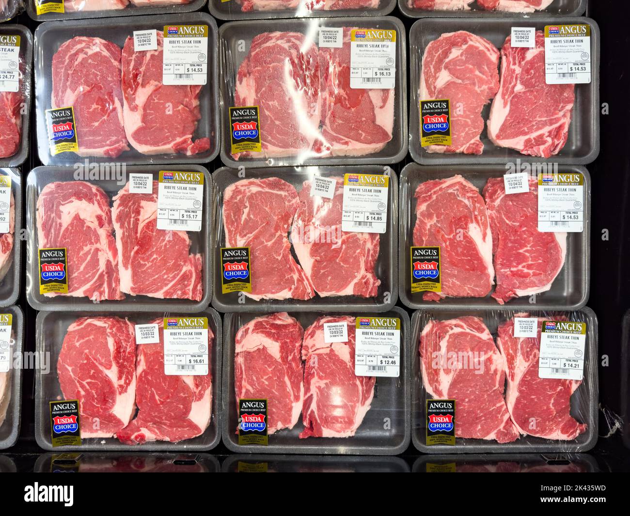 Novi, Michigan, USA - Sep 29, 2022 : Angus premium fresh raw beef ribeye steak thin wrapped in vacuum plastic packing at Walmart store Stock Photo
