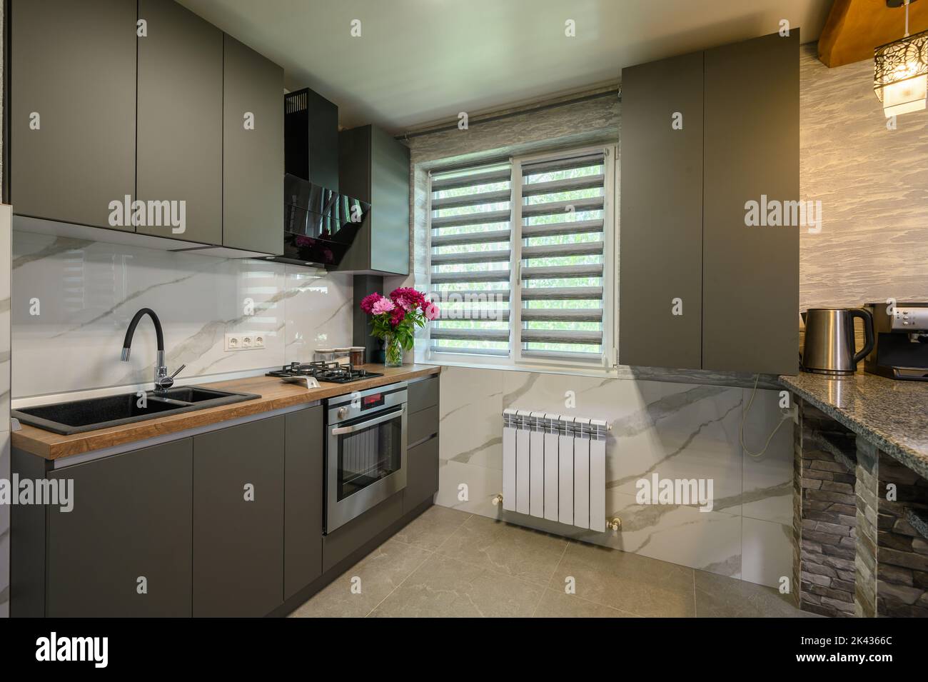 Interior of modern trendy grey kitchen Stock Photo - Alamy