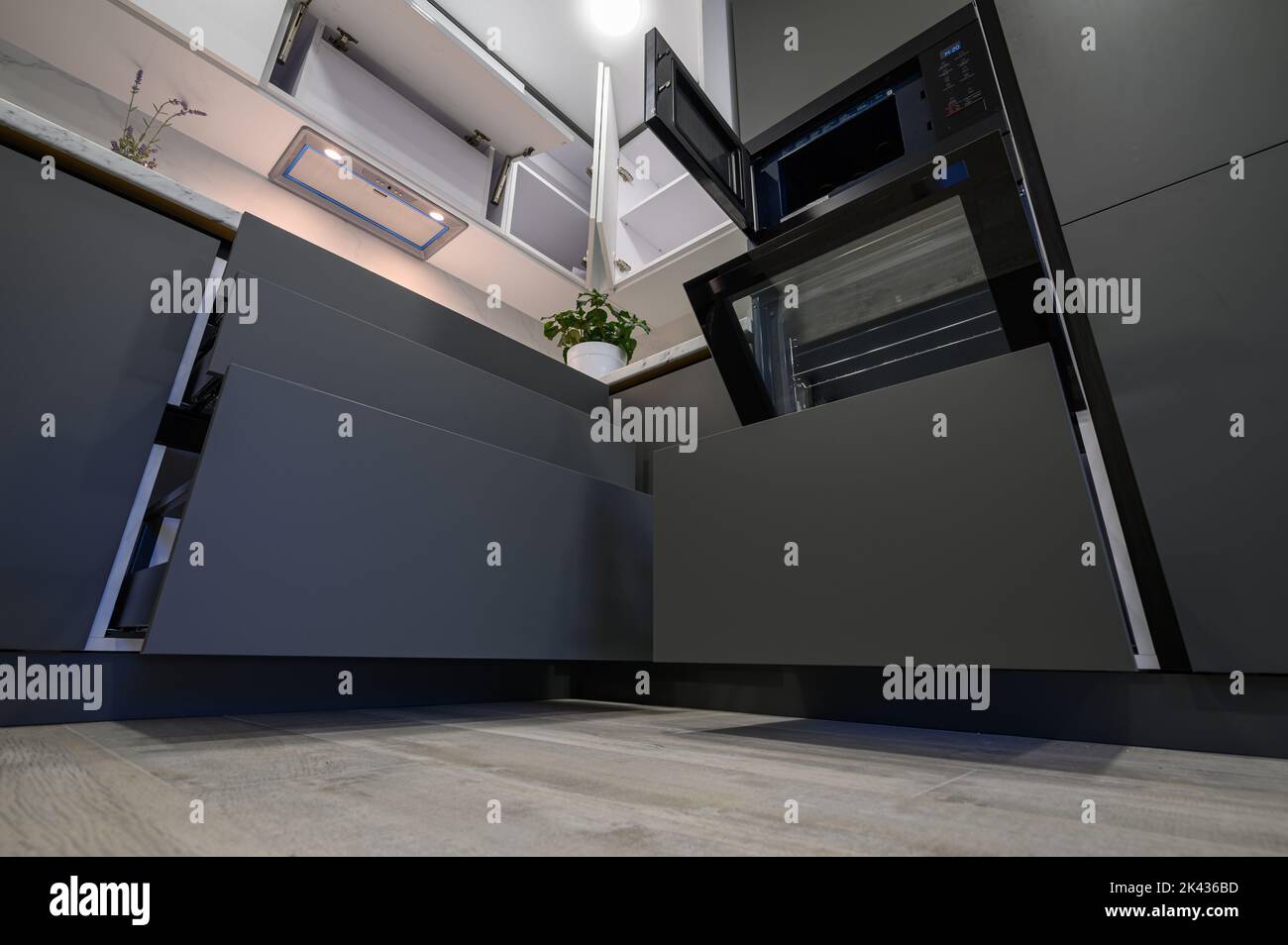 Modern simple trendy dark grey and white kitchen Stock Photo - Alamy