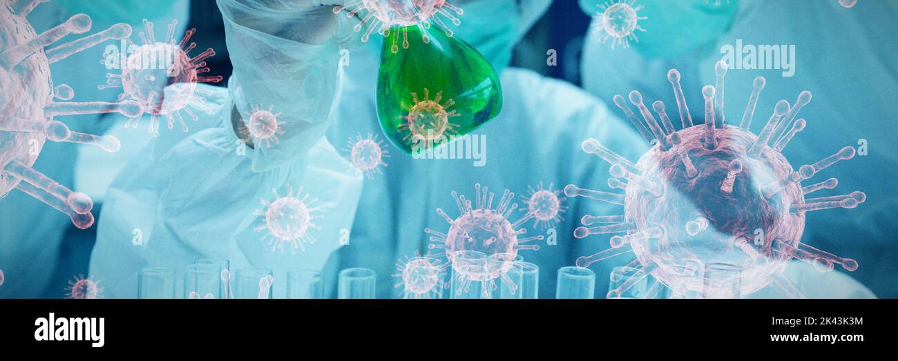 coronavirus on white background against chemist mixing green liquid in beaker with two chemists watching. Testing for Coronavirus, global pandemic con Stock Photo