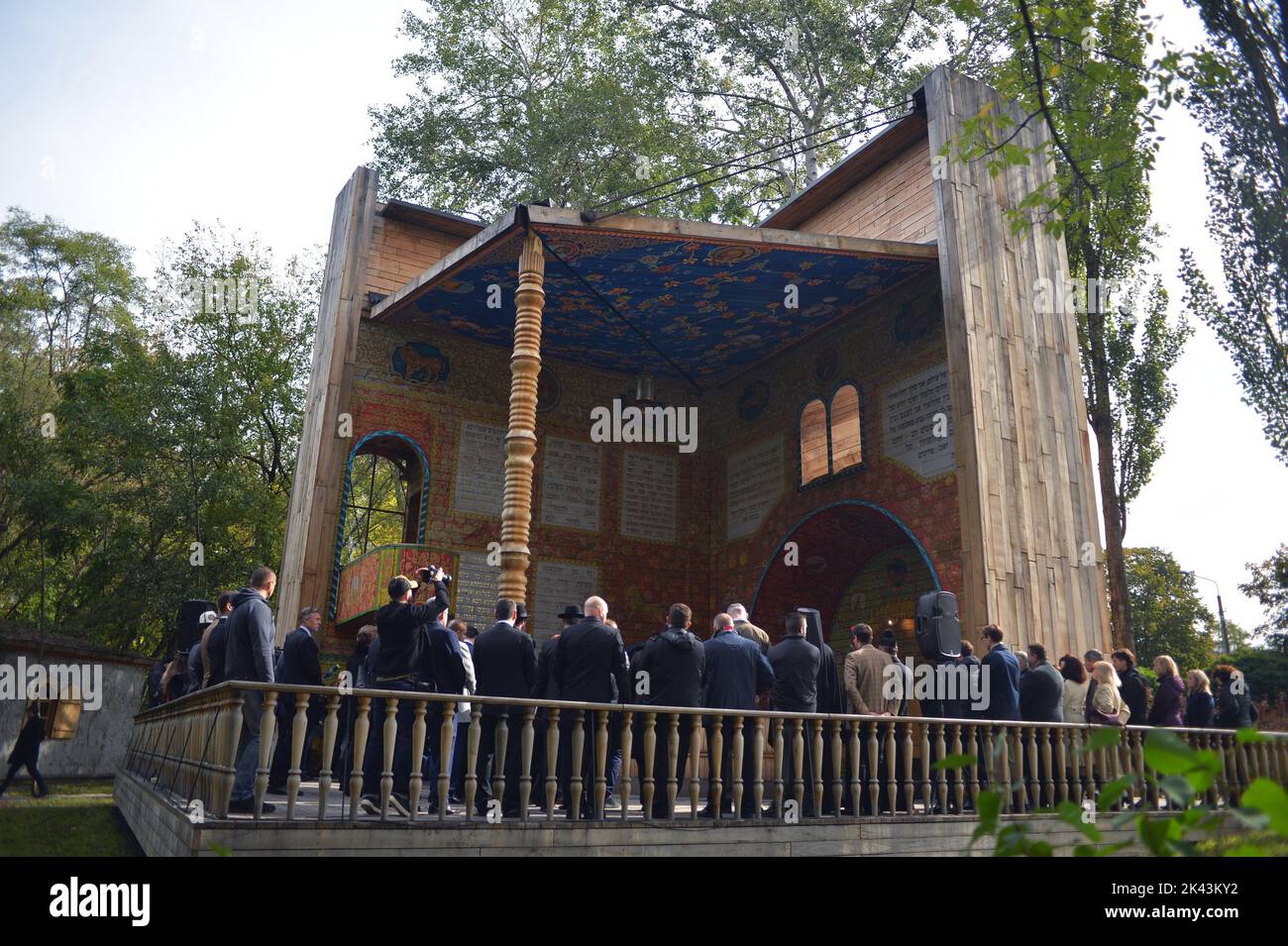 KYIV, UKRAINE - SEPTEMBER 29, 2022 - Participants of a joint interreligious prayer dedicated to the Day of Remembrance of the Babyn Yar Victims are seen at the symbolic Place for Reflection synagogue on the territory of the Babyn Yar National Historical and Memorial Reserve, Kyiv, capital of Ukraine. Stock Photo
