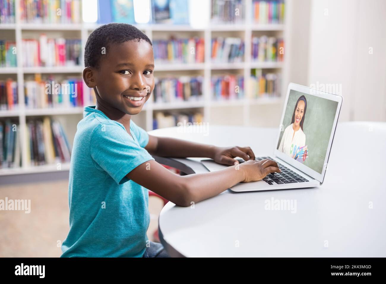 Portrait of male african american student having a video call with ...