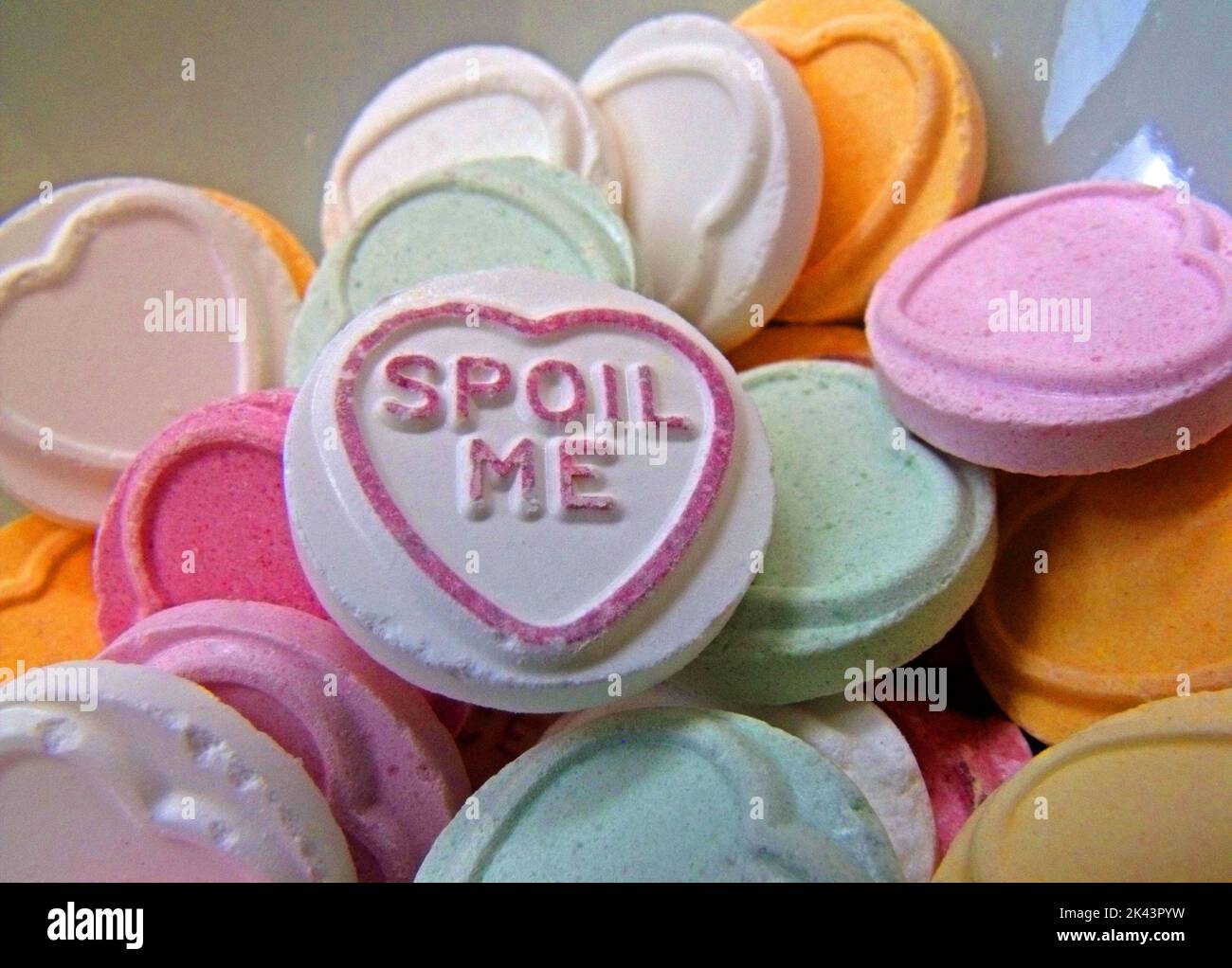 Love Hearts sweets, Spoil Me Stock Photo